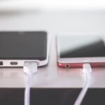 two phones on white table