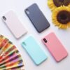 four assorted-color iPhone X cases